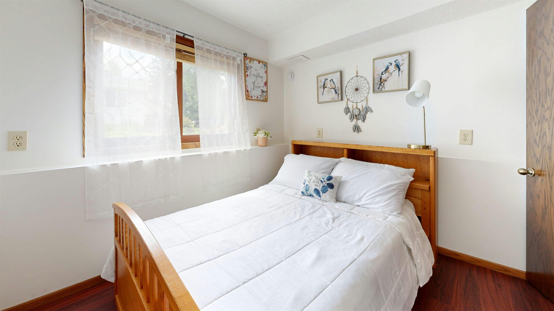 Bedroom with simple wood furniture and a calmer natural palette