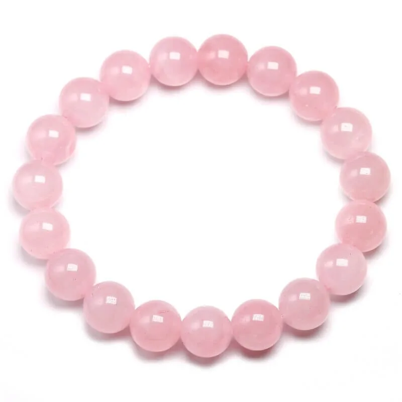 Rose quartz bead bracelet on a white background showing a softer feng shui bracelet direction